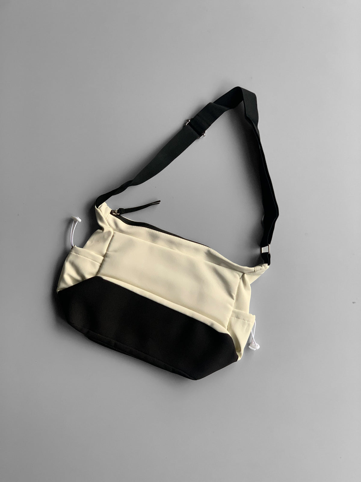 SOURCE imp messenger bag
