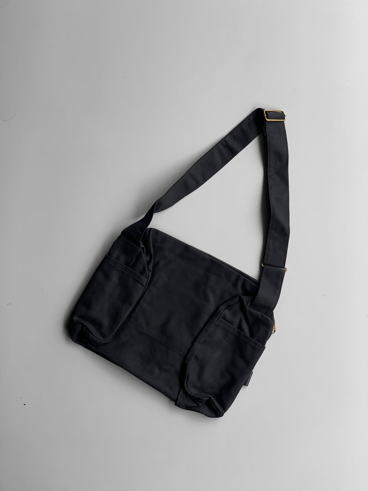 black nylon messenger bag
