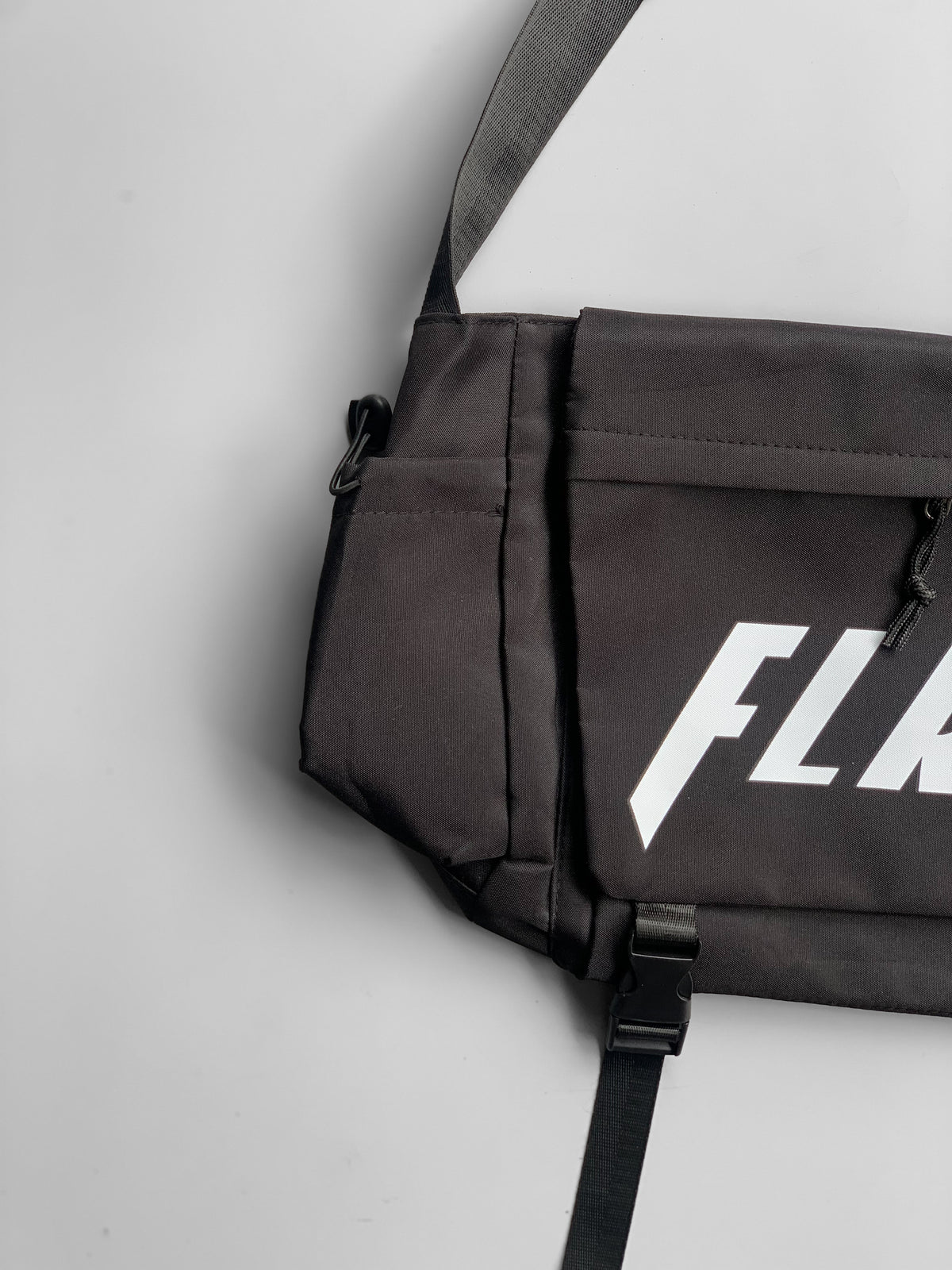 FLRSH imp messenger bag