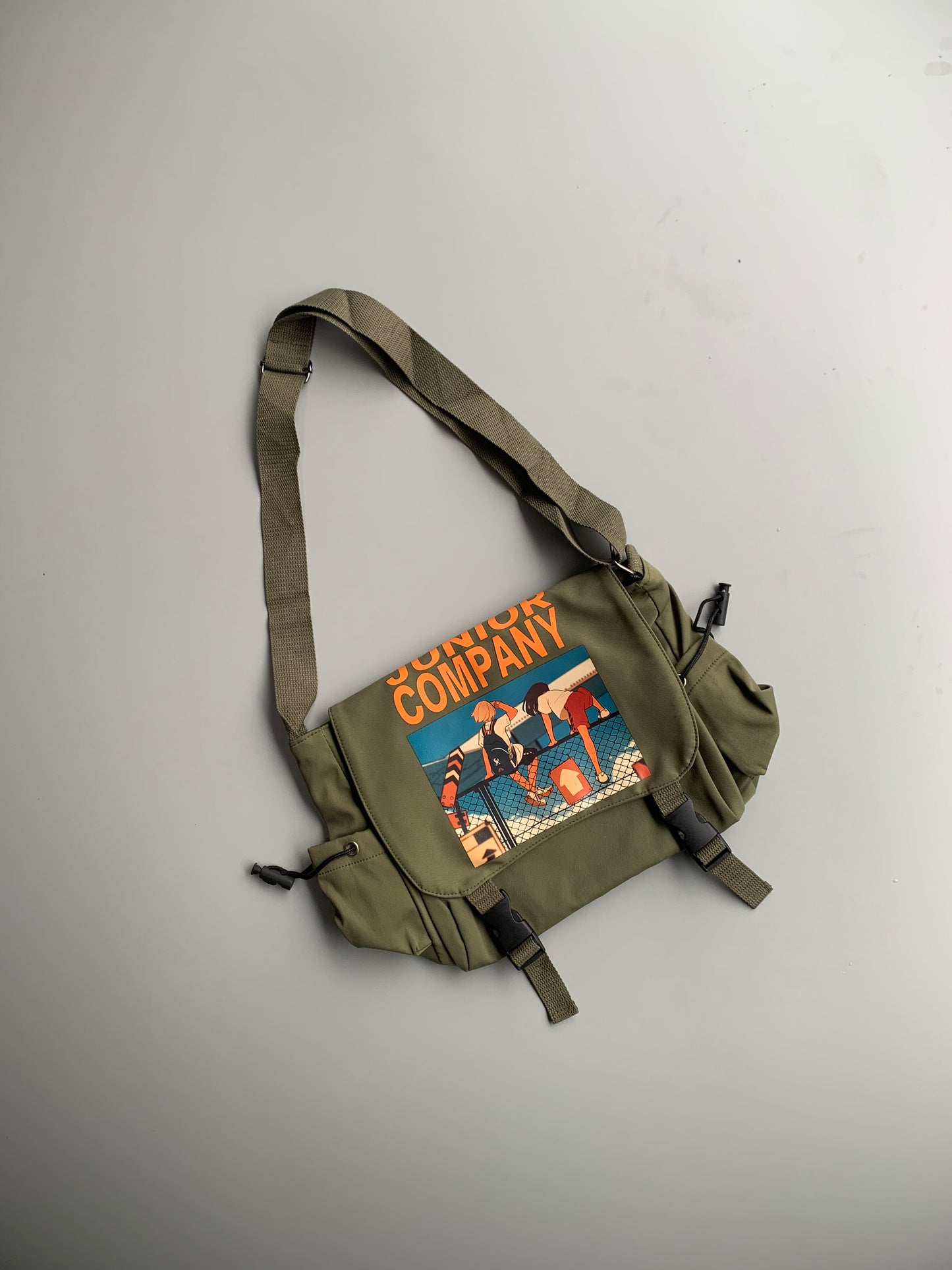 Junior Company Imp grean sling