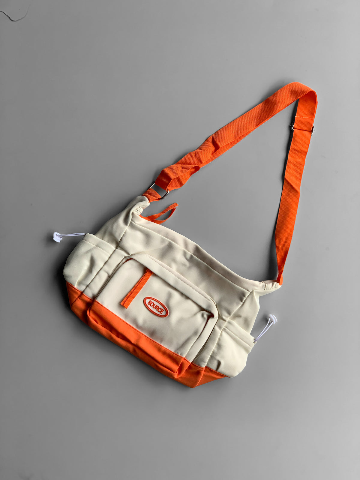 SOURCE imp messenger bag