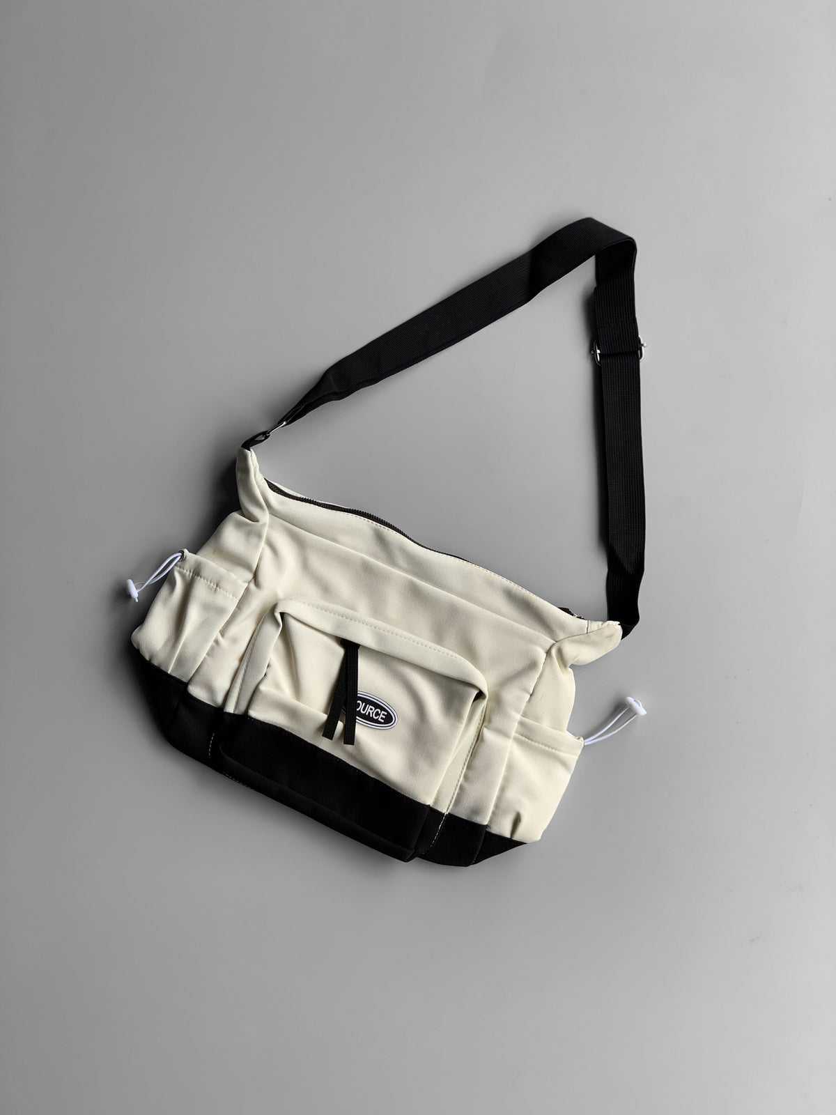 SOURCE imp messenger bag