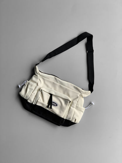 SOURCE imp messenger bag