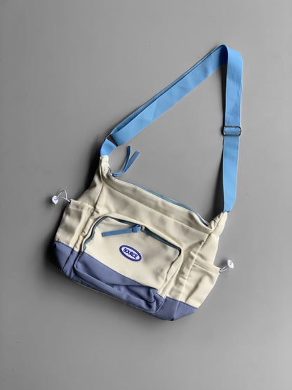 SOURCE imp messenger bag