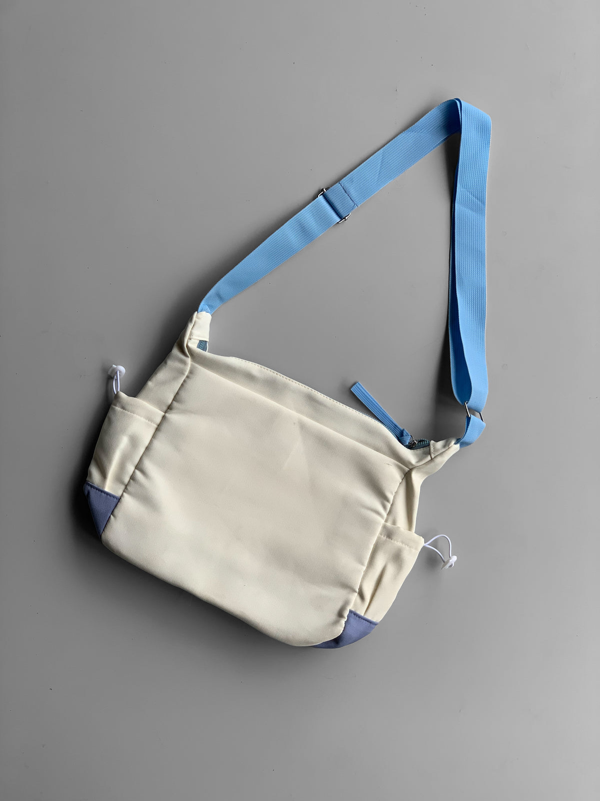 SOURCE imp messenger bag