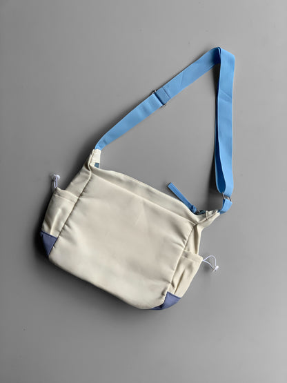 SOURCE imp messenger bag